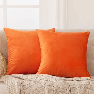 Orange best sale throw cushions